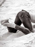 Brett Rossi posing at the beach