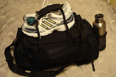 workout bag, gym bag, sneakers, water bottle