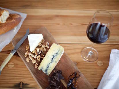 wine, cheese plate, fruits, walnuts