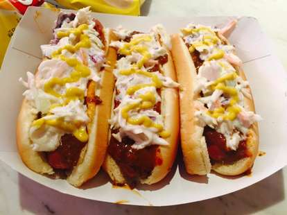 three hot dogs with coleslaw from weenie a go go in cleveland ohio