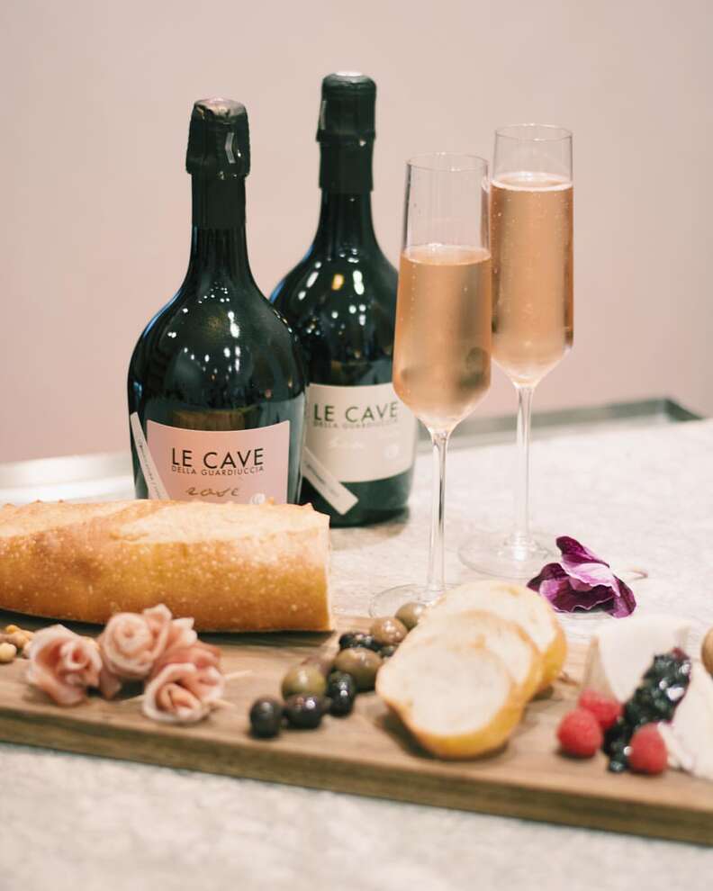 Glasses of Le Cave wine and charcuterie board at Market St. Wine Shop