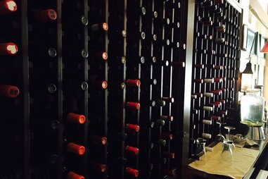 Wine shelf at Charleston’s wine bar