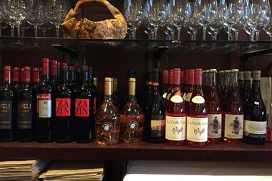 Wine bottles and glasses in Pastiche Bistro and Wine Bar in Milwaukee, Wisconsin