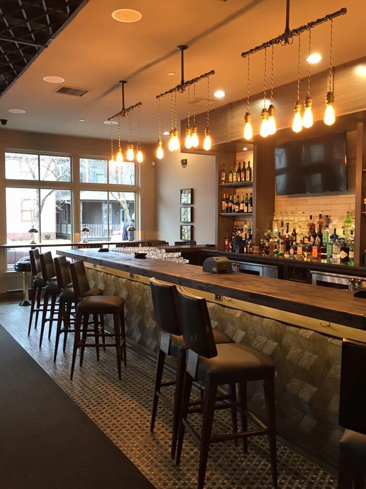 Softly lit interior of Vida wine bar