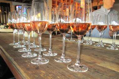 tasting glasses of rose wine at vino venue