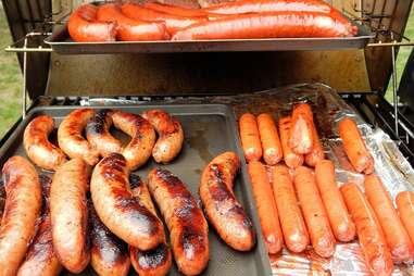 Hot dogs being grilled at a BBQ