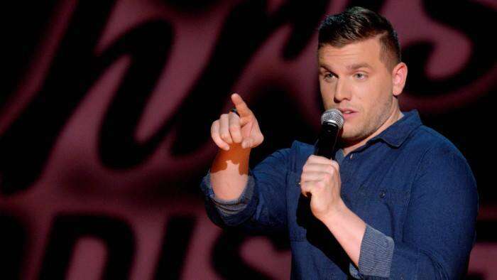 Chris Distefano performing at Laugh Boston stage