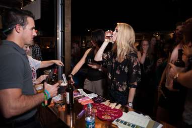Woman drinking at Rock 'n Roll Wine music event in Las Vegas, Nevada