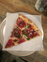 Single slice of combo pizza at Presidio Pizza Company