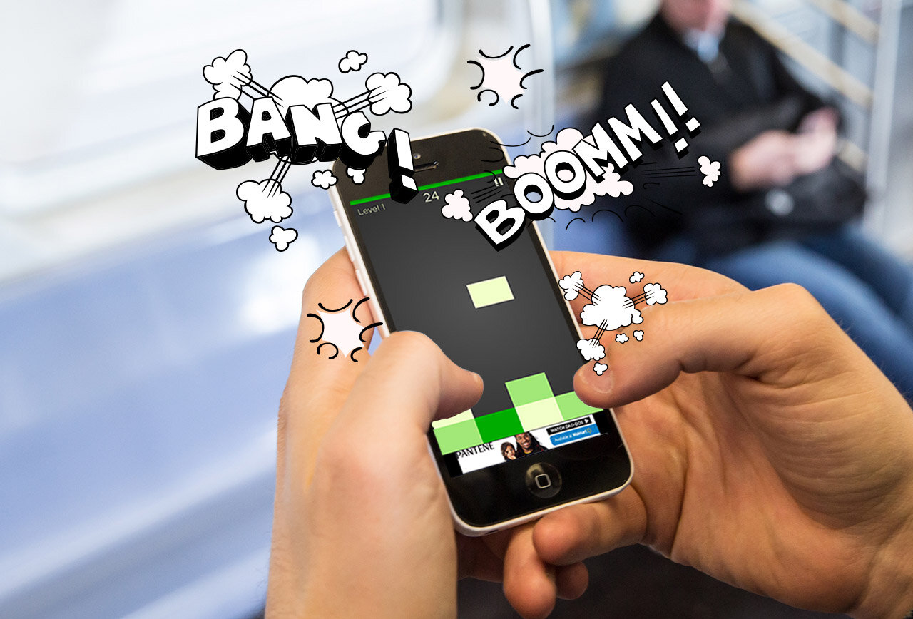 man playing game on an iPhone 5s with sound on