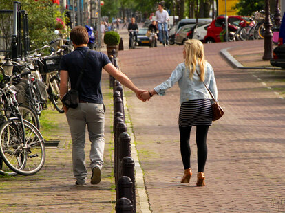 Couple strolling while on a European vacation