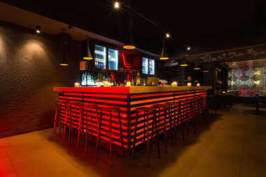 Neon lit bar counter at Ginger Grill & Asian Tapas