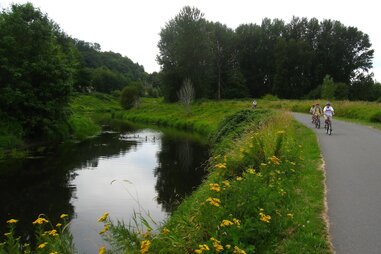 burke-gilman trail in seattle, riding bikes by the water