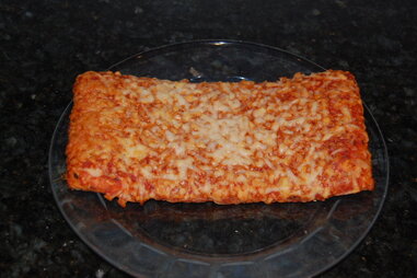 A slice of frozen Ellio’s pizza on a plate