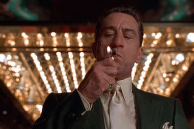 Robert DeNiro lighting a cigarette in Martin Scorsese's Casino