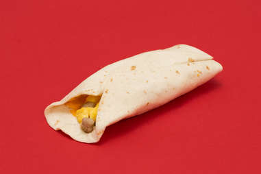 McDonald's sausage burrito on red background