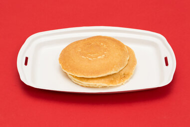 McDonald’s hot cakes on white paper platter
