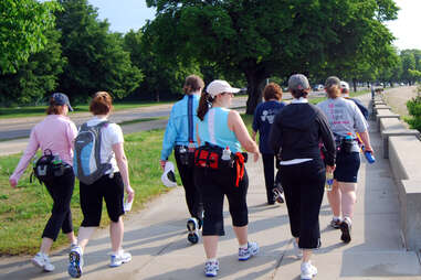 women wearing fanny packs