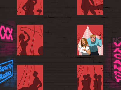 Windows of sex hotel, where silhouettes of couples are having sex