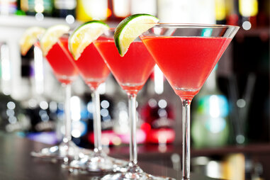 cosmos lined up on bar, vodka, martini