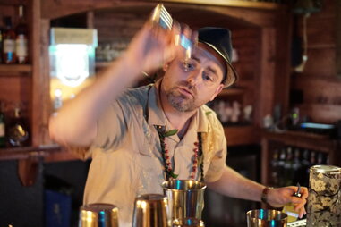 bartender mixing a drink