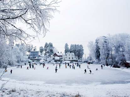 People playing hockey in DIY rink