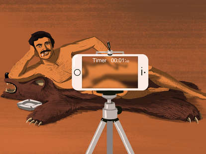 Cartoon of naked Bert Reynolds on a bearskin rug with an iPhone taking his picture