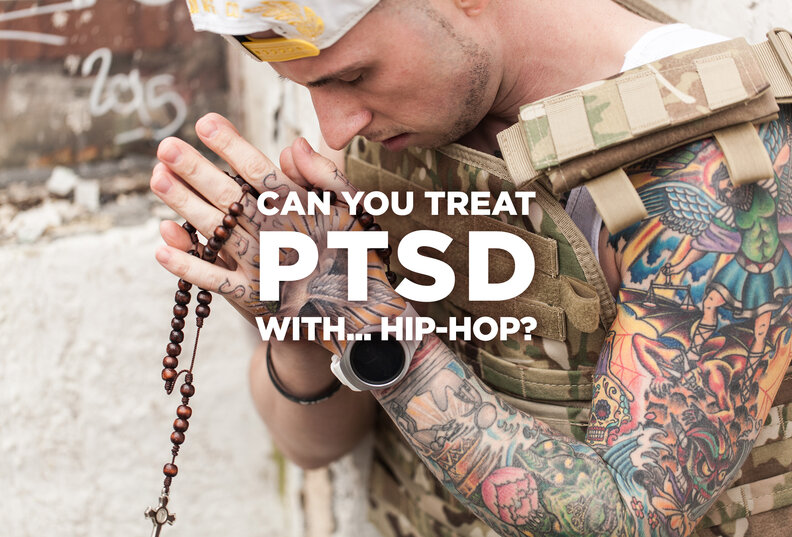 ?Rapper Anthony Bunch prays with rosary beads