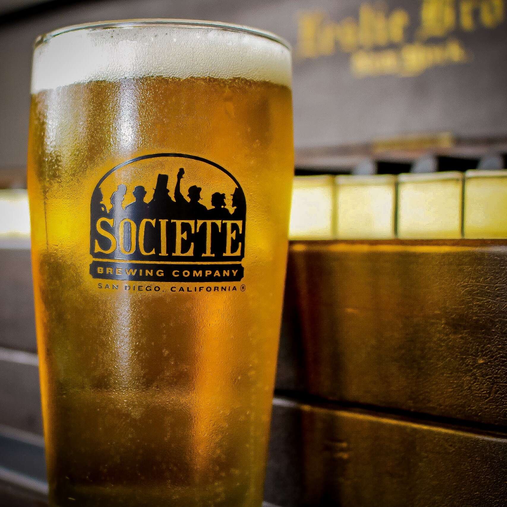 Full glass of Societe pale ale beer