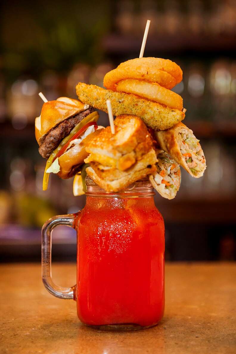 bloody caesar with burger, onion rings and grilled cheese
