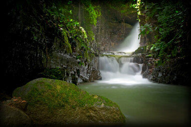 A tranquil, misty waterfall in Costa Rica