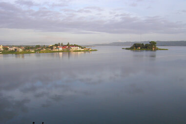 Men sitting on the dock in Guatemala