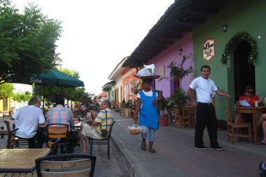 Residents carrying groceries in Granada, Nicaragua