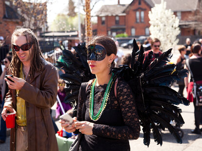 Masked guests at Detroit’s Marche Du Nain Rogue