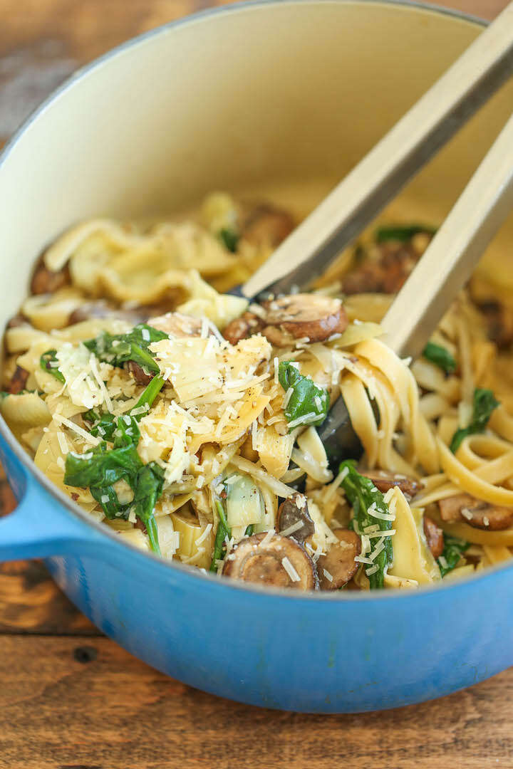 Mushroom, spinach, and artichoke pasta in pot