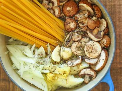 Raw pasta ingredients in pot
