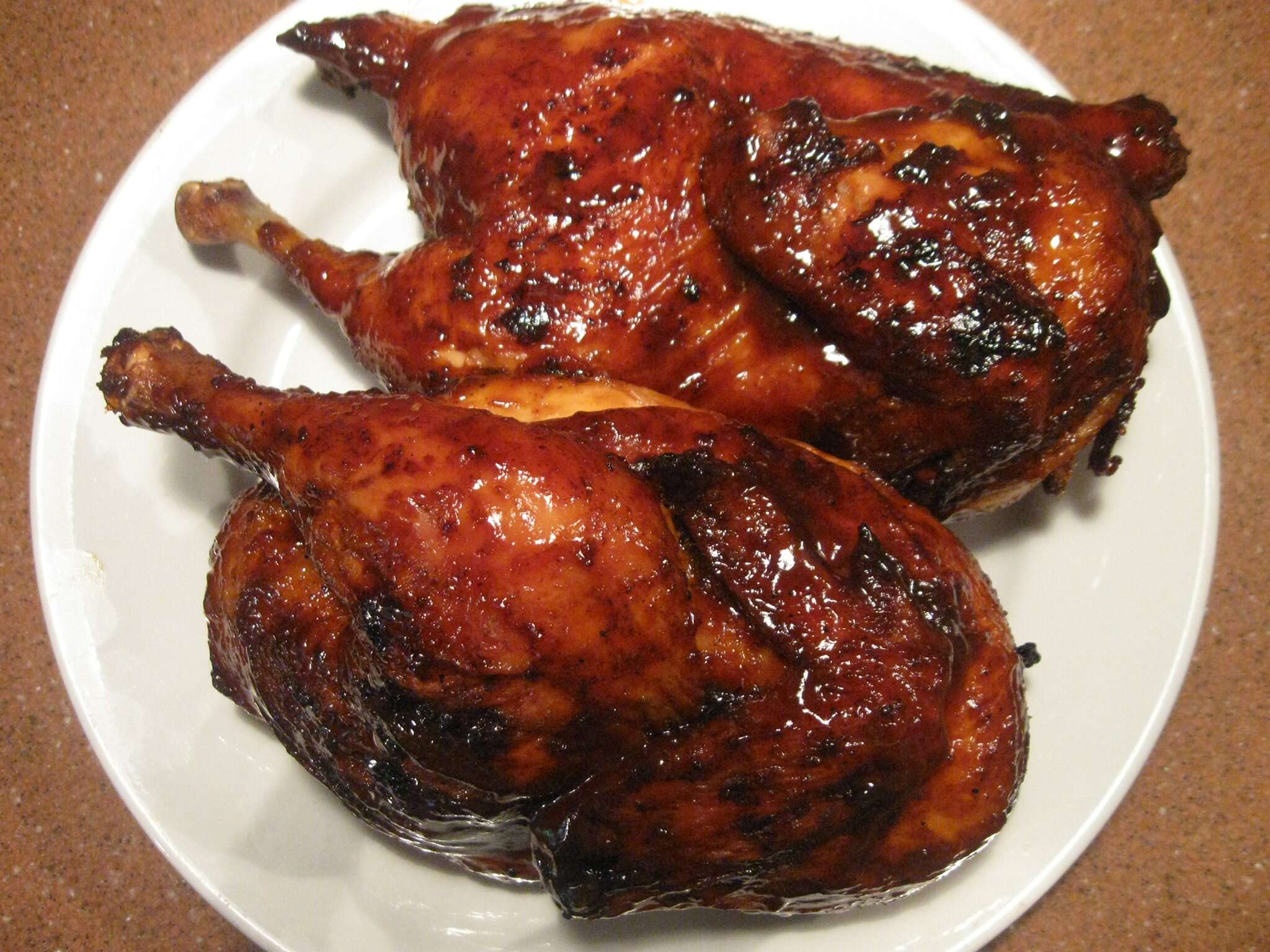 Barbecued chicken on plate