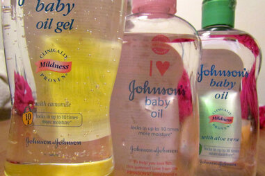 Bottles of Johnson’s baby oil in a row