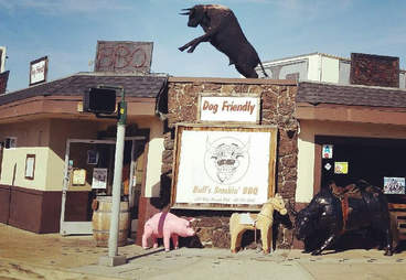 Jumping bull decoration on top of Bull's Smokin' BBQ Restaurant