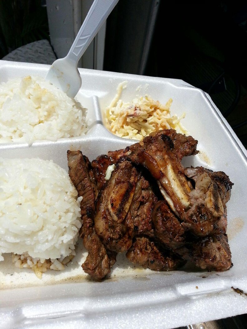 Ribs with rice in styrofoam container