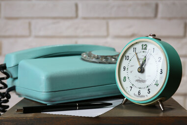 Plain piece of white paper on bedside table