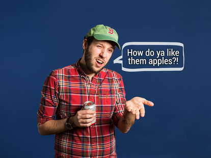 Hipster in plaid shirt wearing Boston Red Sox cap with speech bubble