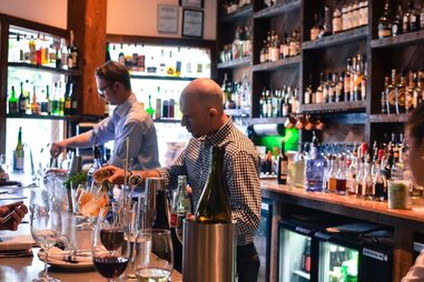 Bartenders making drinks