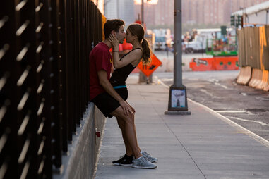 Couple kissing on street