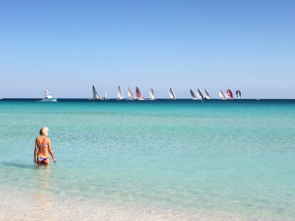 Woman standing in Miami Beach water