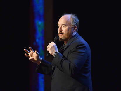 Comedian Louis C.K. performs on stage