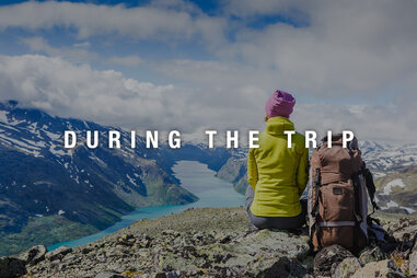 Backpacker hiking in Norway during her trip