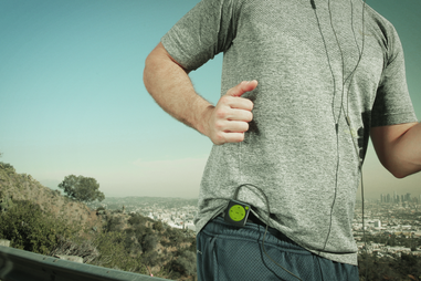 runner wearing Mighty Audio