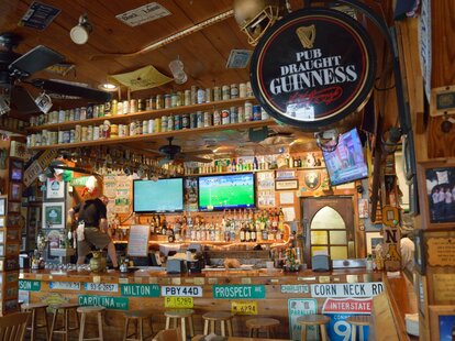 Crowded bar shelves at Dunleavy’s Pub