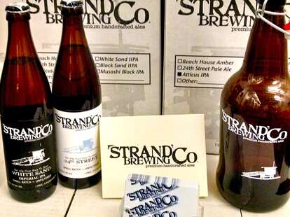 Strand Brewing Co brewery bottles napkins la california